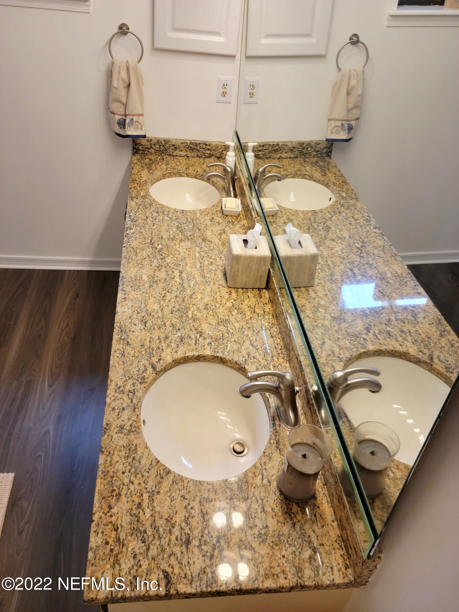 5425 Spring Brook Road Jacksonville, FL 32277 - Photo 25 of 35 a bathroom with a sink