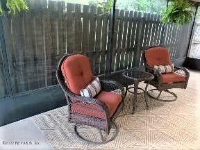 5425 Spring Brook Road Jacksonville, FL 32277 - Photo 28 of 35 a outdoor living space with furniture and garden view