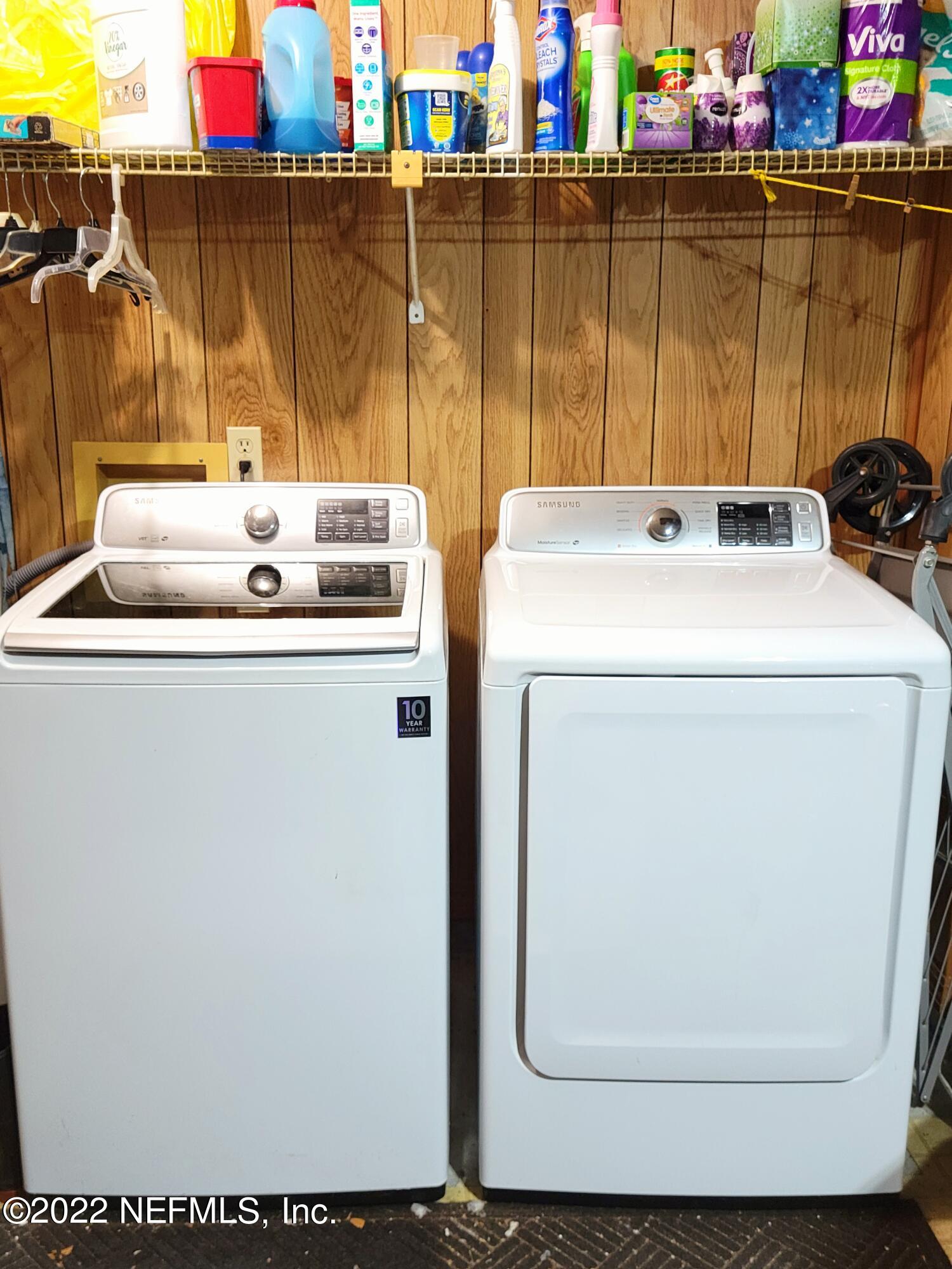 5425 Spring Brook Road Jacksonville, FL 32277 - Photo 31 of 35 a utility room with dryer and washer