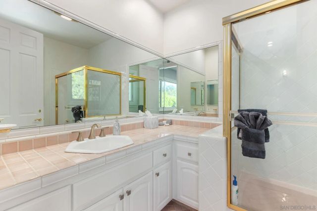 a view of a patio with a table and chairs