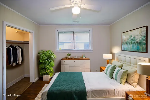 a bedroom with a bed and window