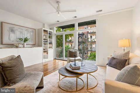 a view of a balcony with a tree