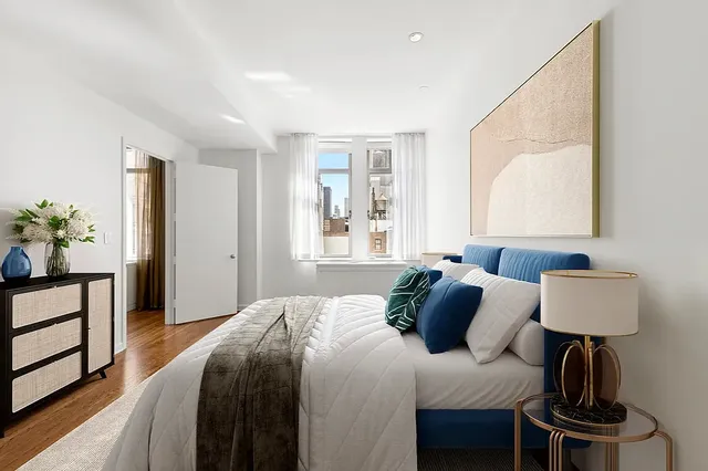 a kitchen with stainless steel appliances granite countertop a sink a stove and cabinets