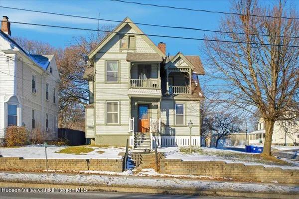 a front view of a house with street