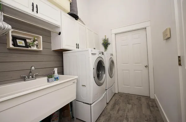 a utility room with dryer and washer