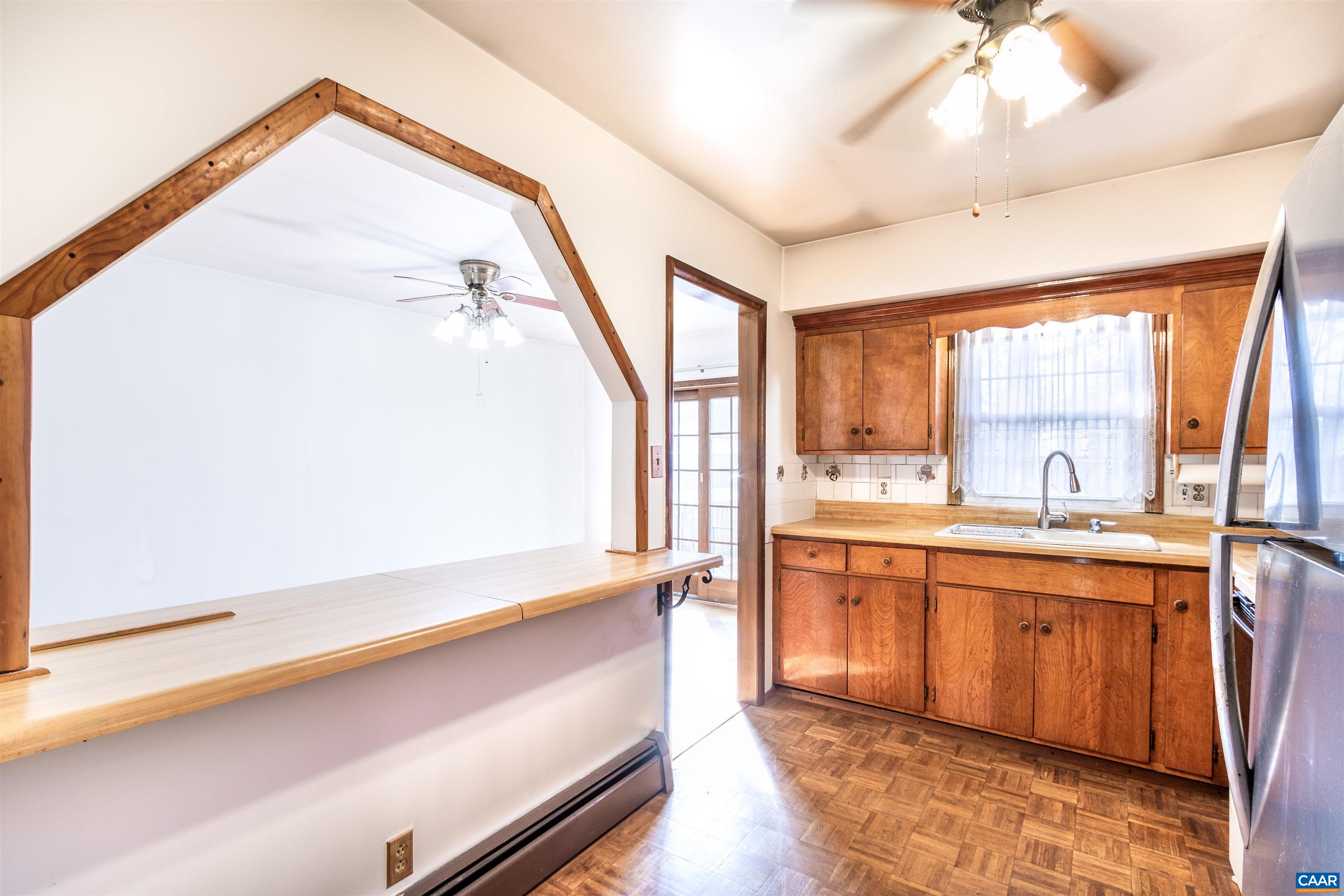187 Warmar Road Ruckersville, VA 22968 - Photo 12 of 35 a view of a kitchen with a sink and a window