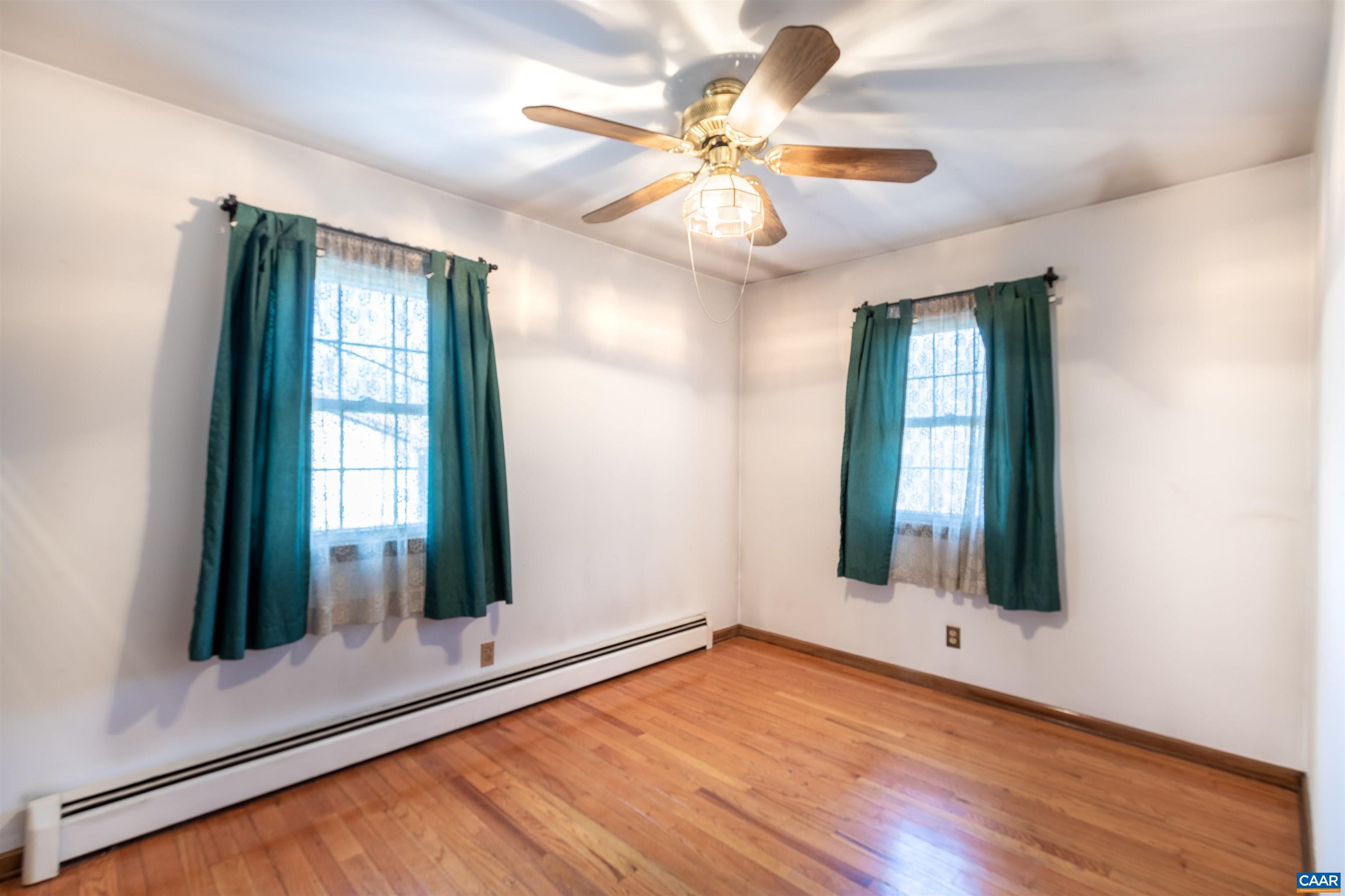 187 Warmar Road Ruckersville, VA 22968 - Photo 20 of 35 wooden floor in an empty room with a window