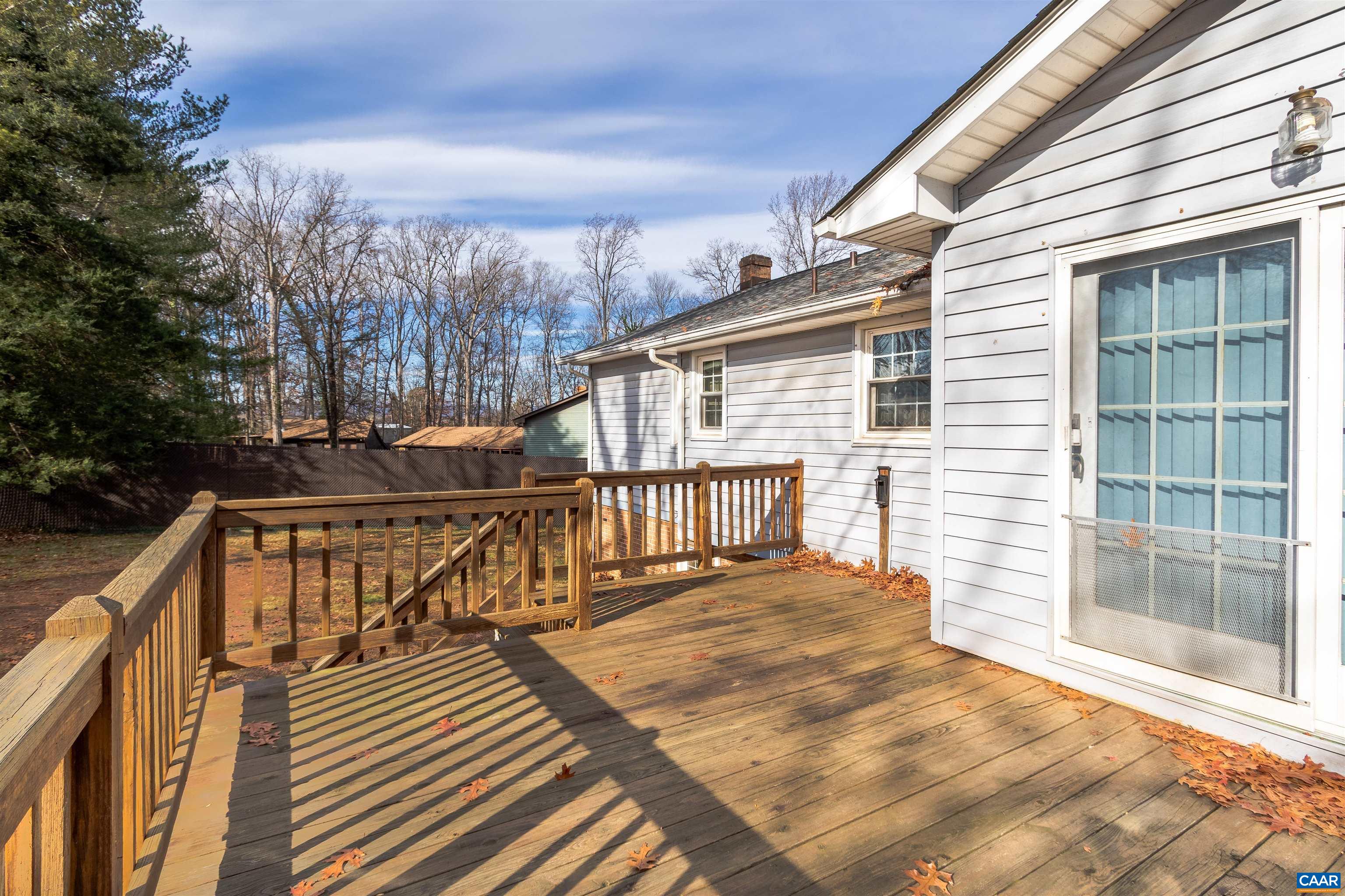 187 Warmar Road Ruckersville, VA 22968 - Photo 2 of 35 a view of a balcony with wooden floor and outdoor seating