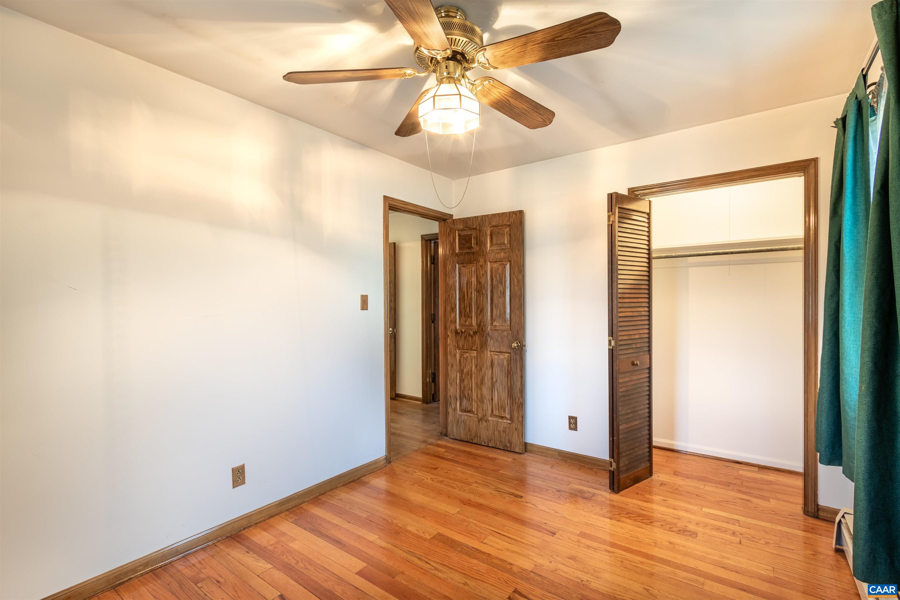 187 Warmar Road Ruckersville, VA 22968 - Photo 21 of 35 a view of an empty room with window and wooden floor