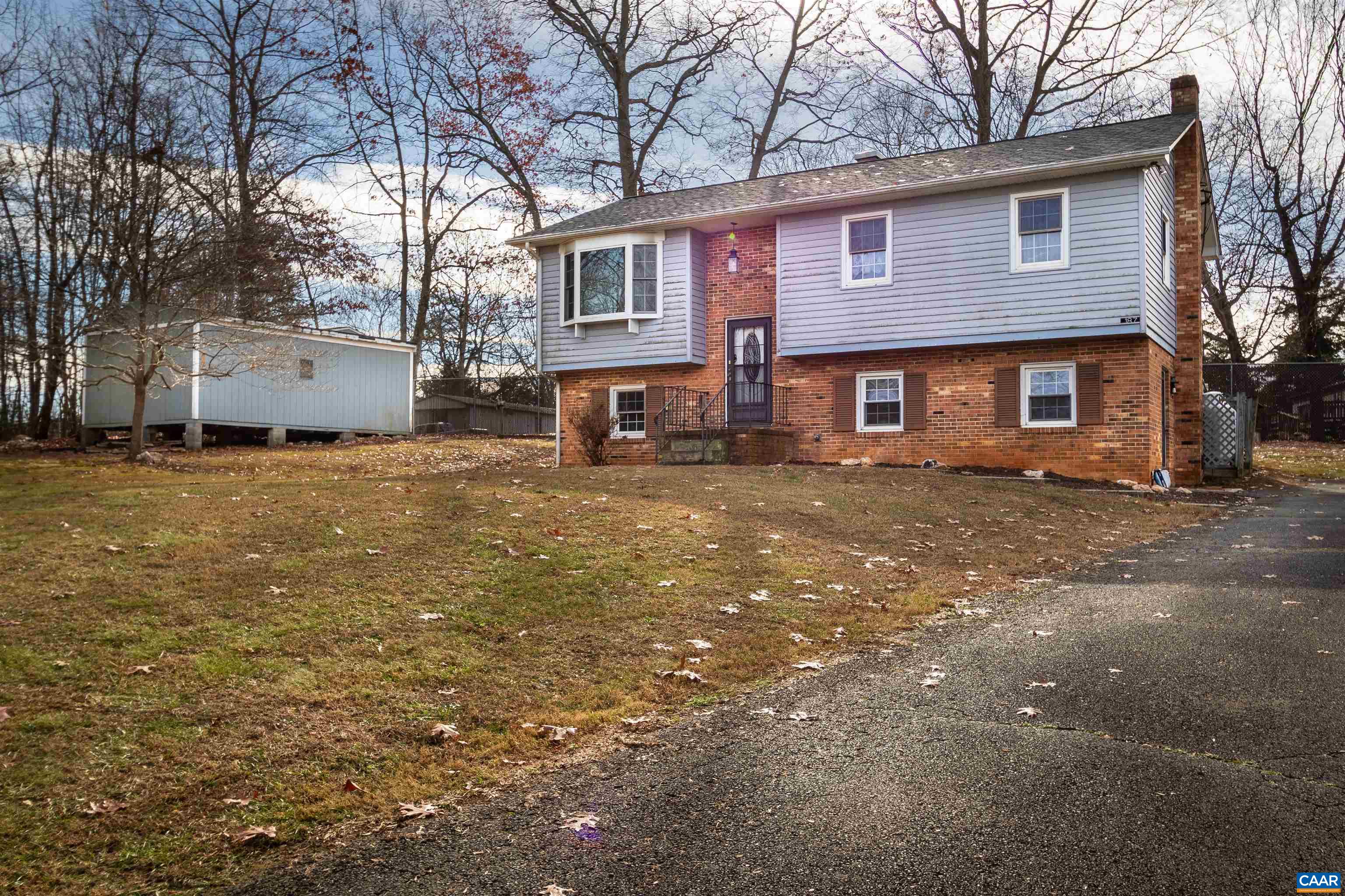 187 Warmar Road Ruckersville, VA 22968 - Photo 3 of 35 a front view of a house with a yard