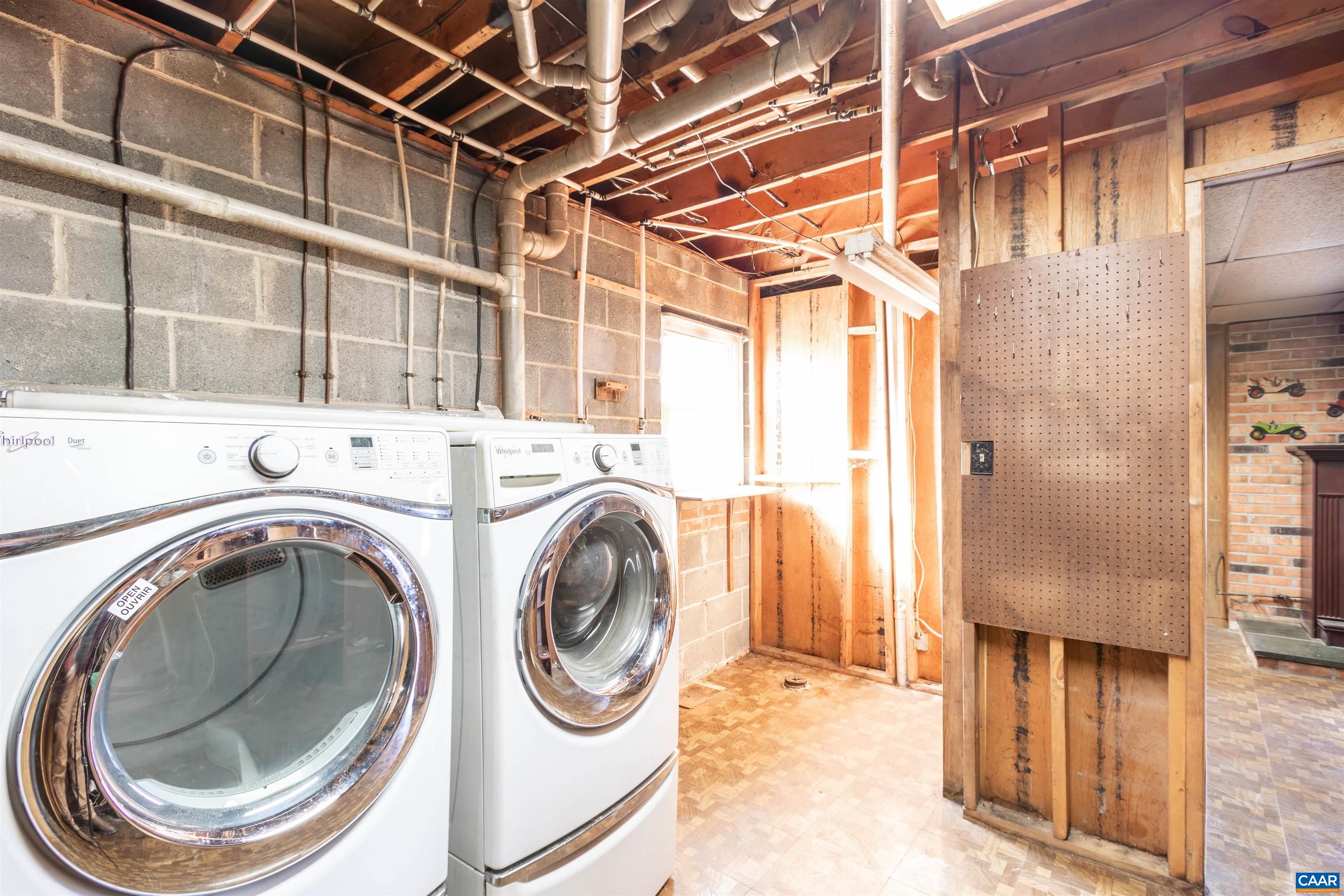 187 Warmar Road Ruckersville, VA 22968 - Photo 32 of 35 a utility room with dryer and washer