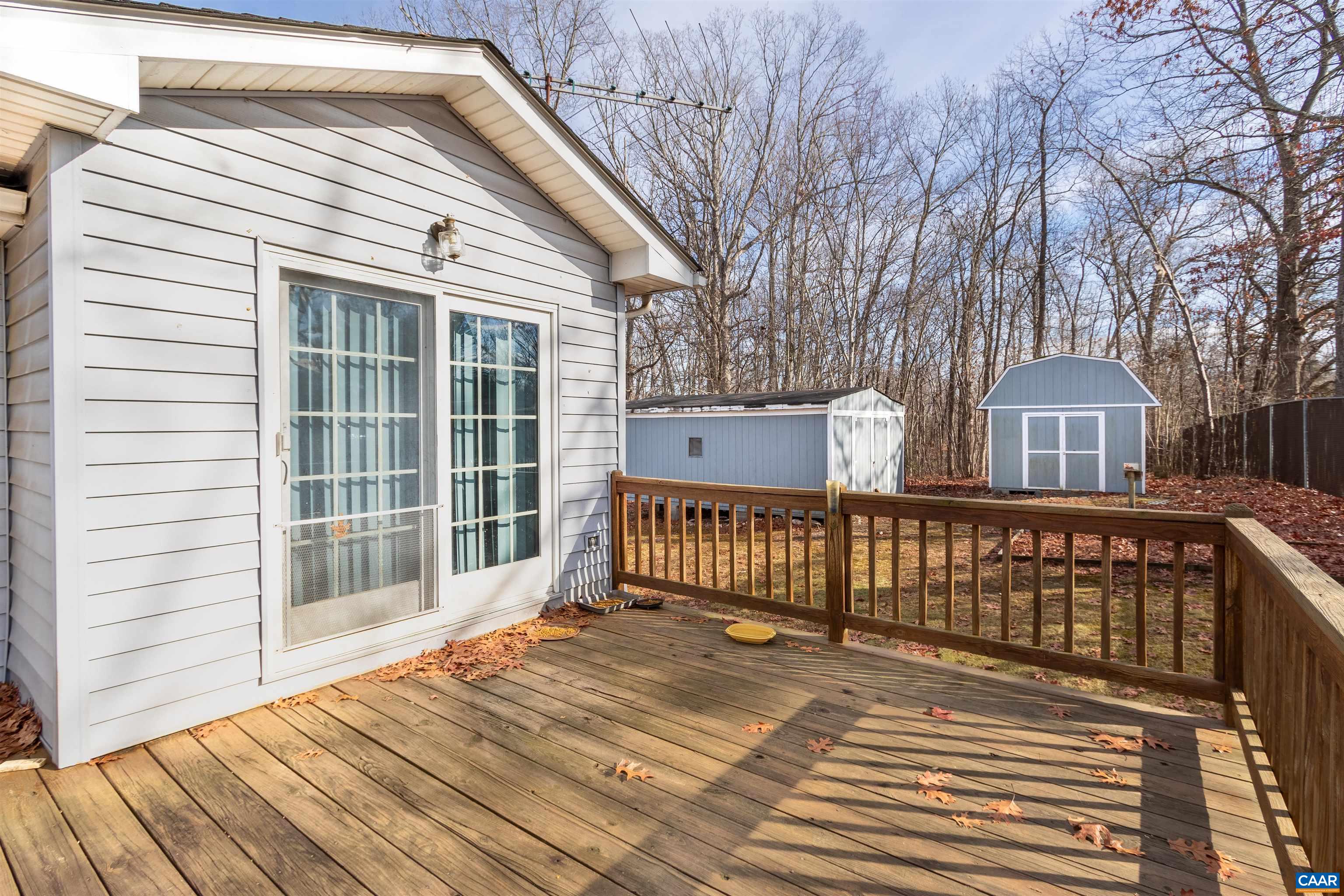187 Warmar Road Ruckersville, VA 22968 - Photo 6 of 35 a front view of a house with large windows