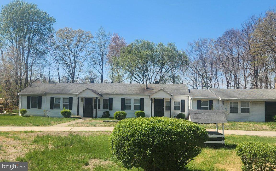 13621 Tower Road Brandywine, MD 20613 - Photo 2 of 10 Charming home with lush greenery.