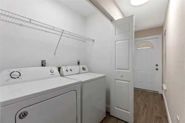 a utility room with dryer and washer