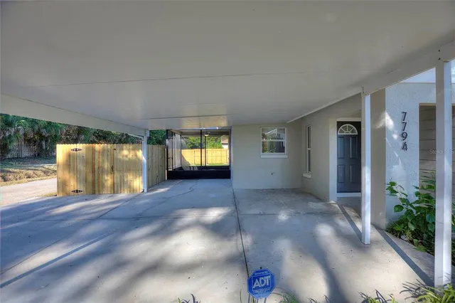 a view of empty room with a flat screen tv