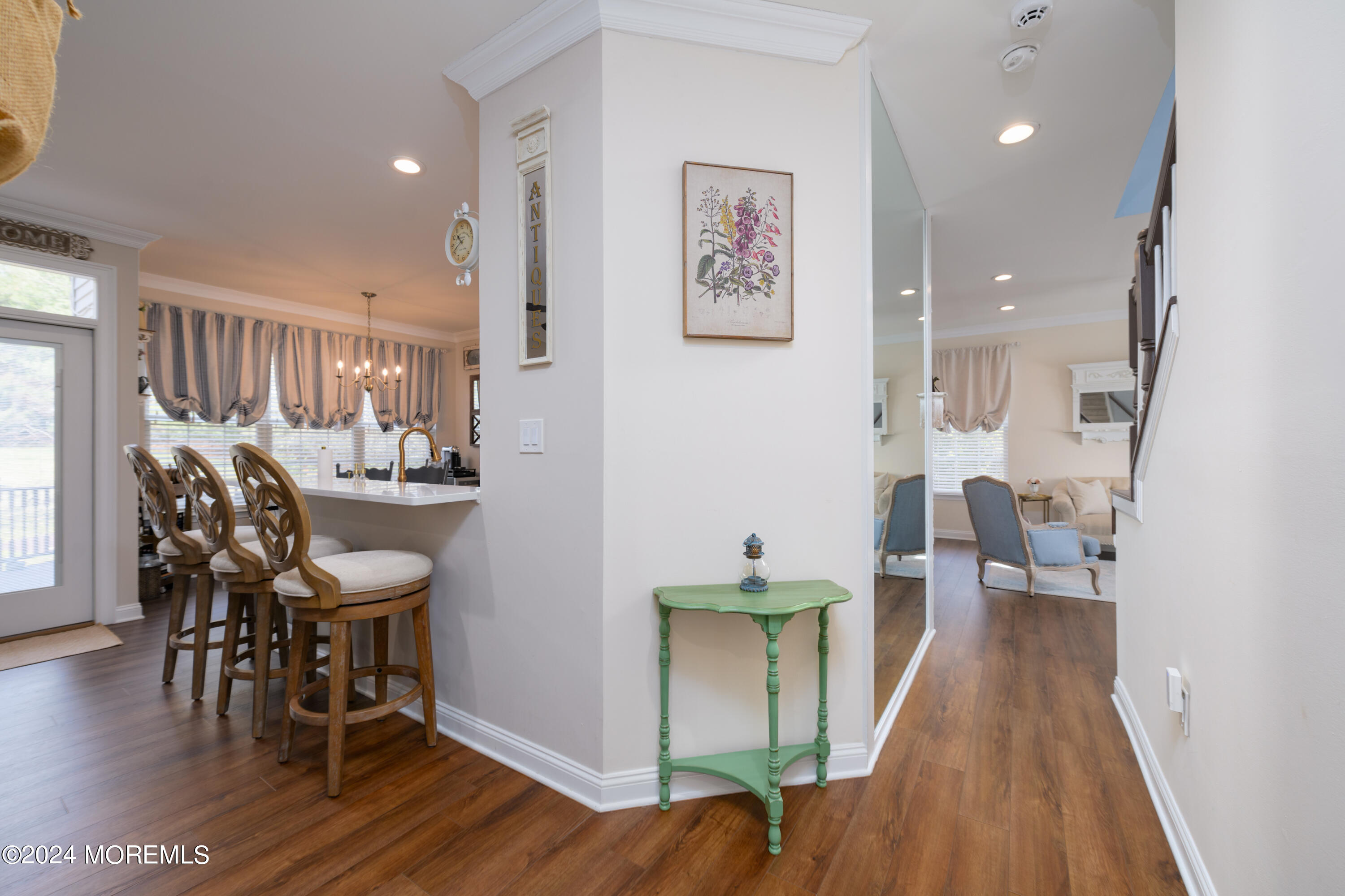 11 Exeter Pass Colts Neck, NJ 07722 - Photo 12 of 26 a view of a dining room with furniture and wooden floor