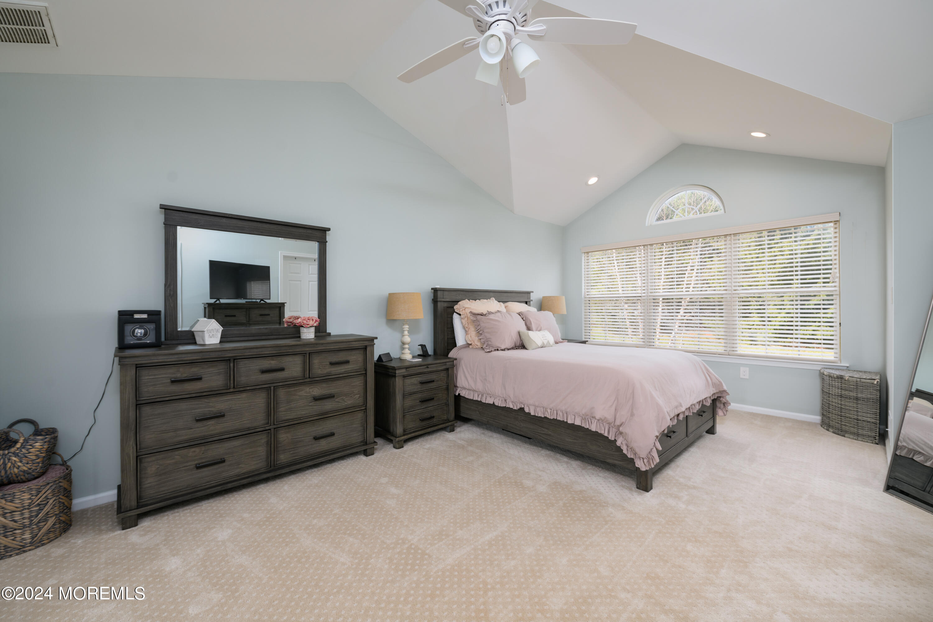 11 Exeter Pass Colts Neck, NJ 07722 - Photo 15 of 26 a bedroom with a bed and a window