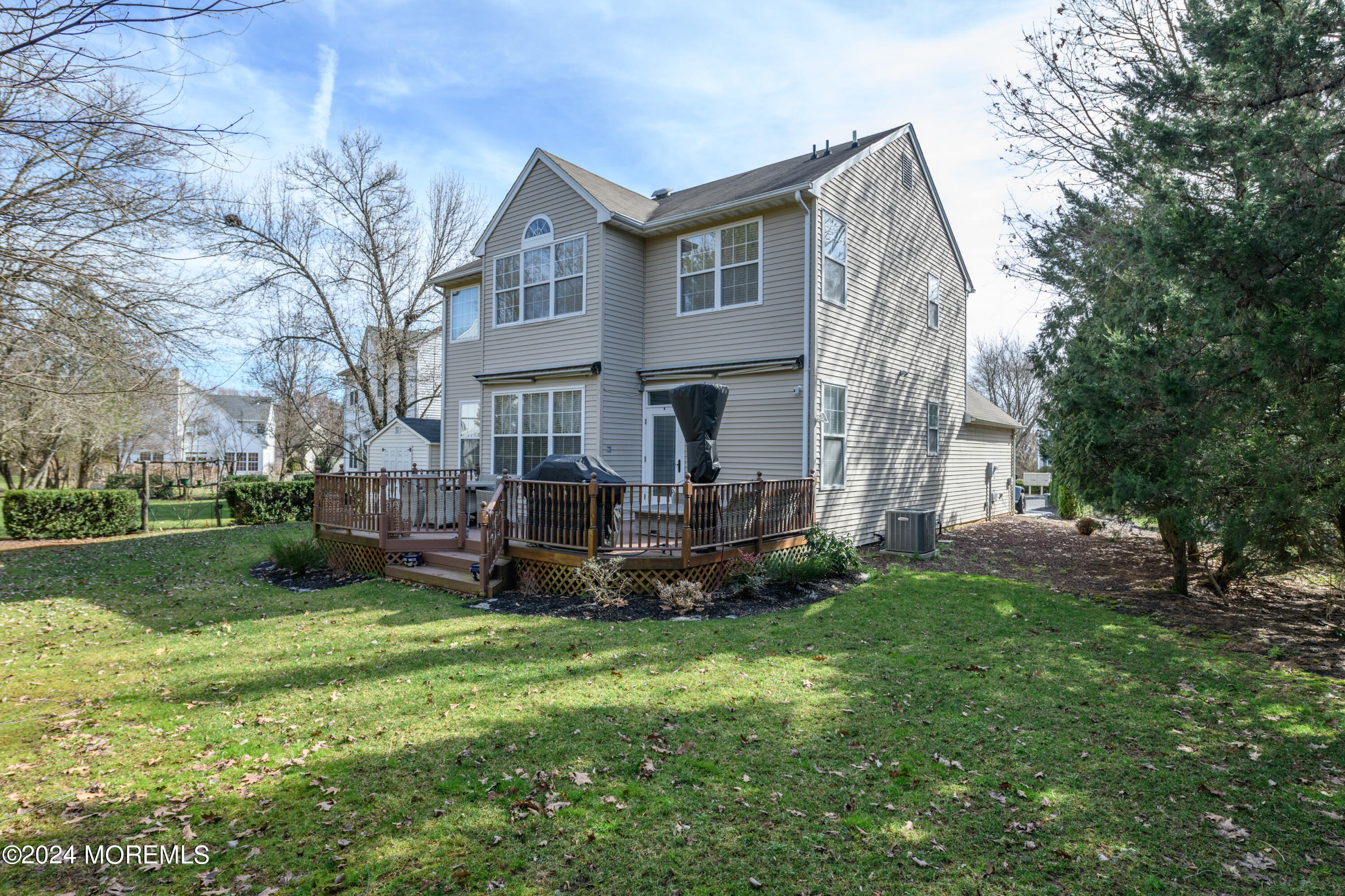 11 Exeter Pass Colts Neck, NJ 07722 - Photo 23 of 26 a view of backyard of house with green space