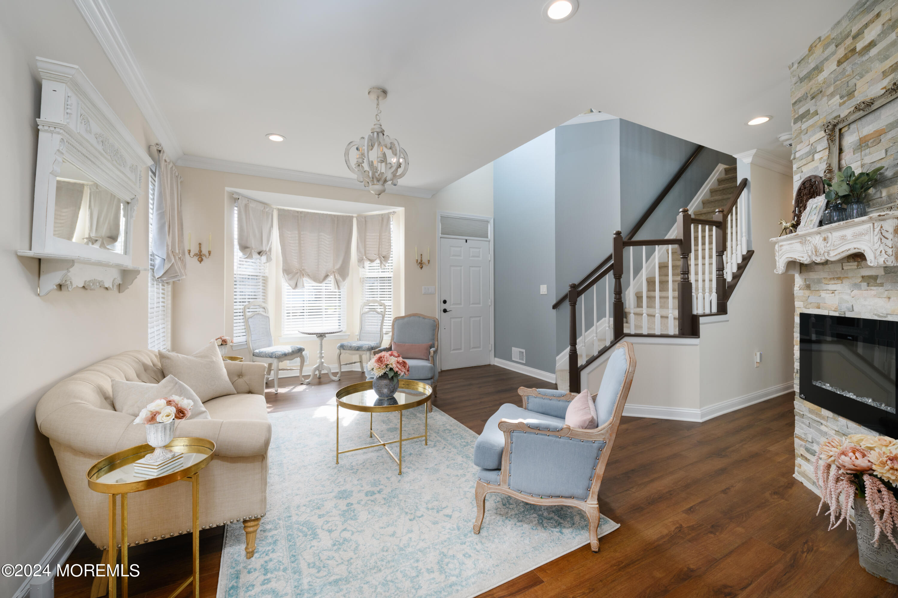 11 Exeter Pass Colts Neck, NJ 07722 - Photo 5 of 26 a living room with furniture and a wooden floor