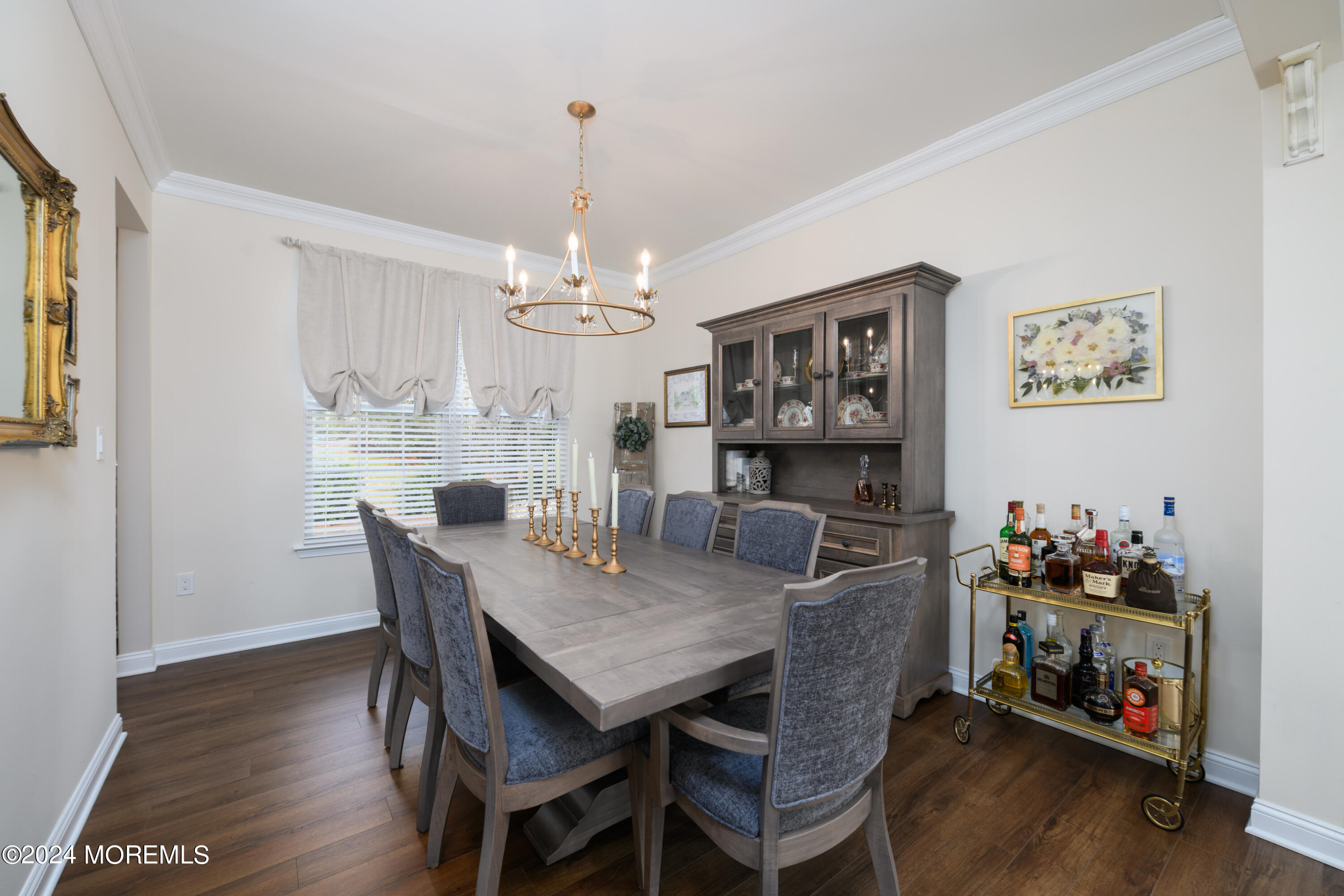 11 Exeter Pass Colts Neck, NJ 07722 - Photo 6 of 26 a view of a dining room with furniture and wooden floor