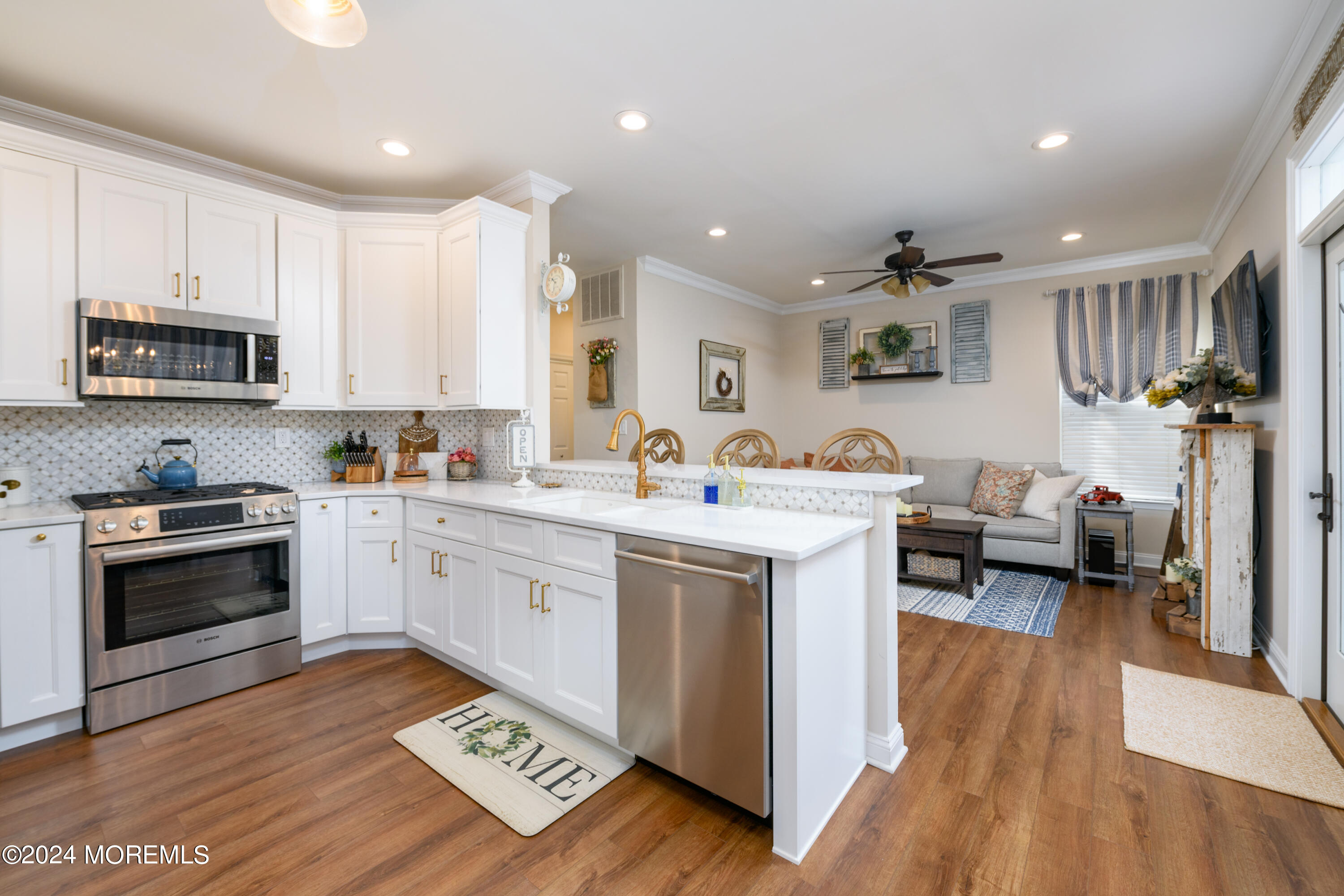 11 Exeter Pass Colts Neck, NJ 07722 - Photo 7 of 26 a kitchen with a sink appliances and cabinets