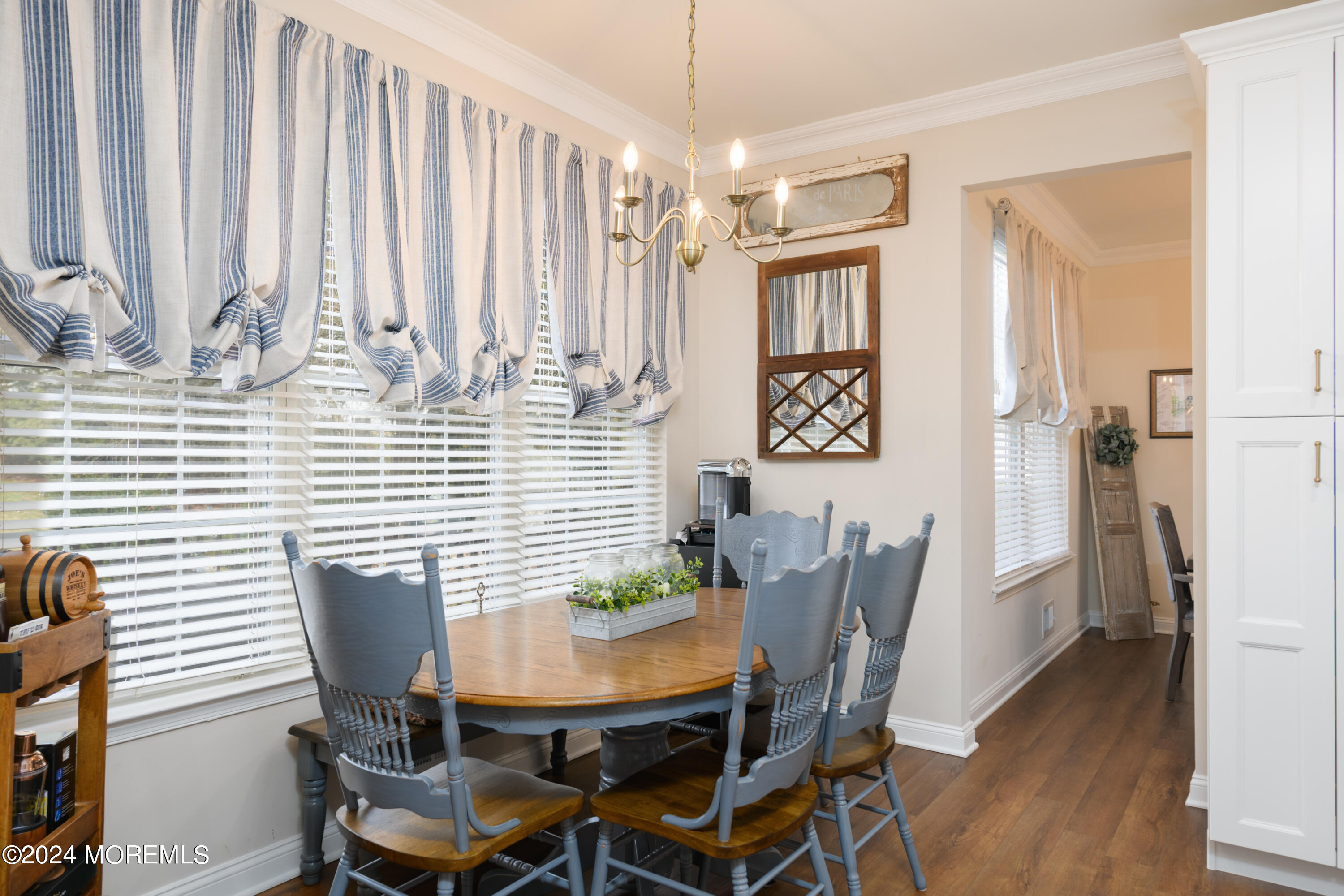 11 Exeter Pass Colts Neck, NJ 07722 - Photo 9 of 26 a view of a dining room with furniture and window