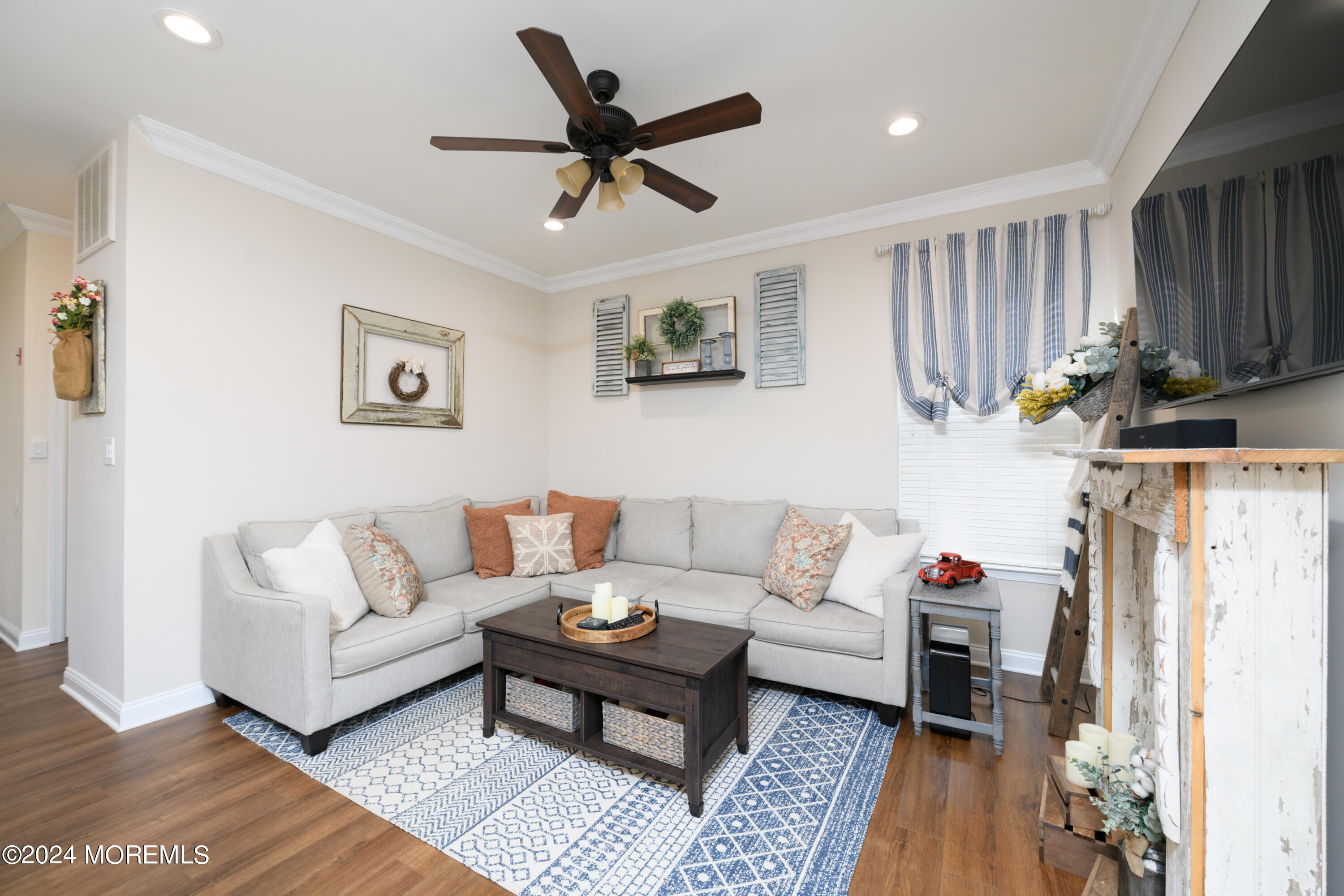 11 Exeter Pass Colts Neck, NJ 07722 - Photo 10 of 26 a living room with furniture and a window