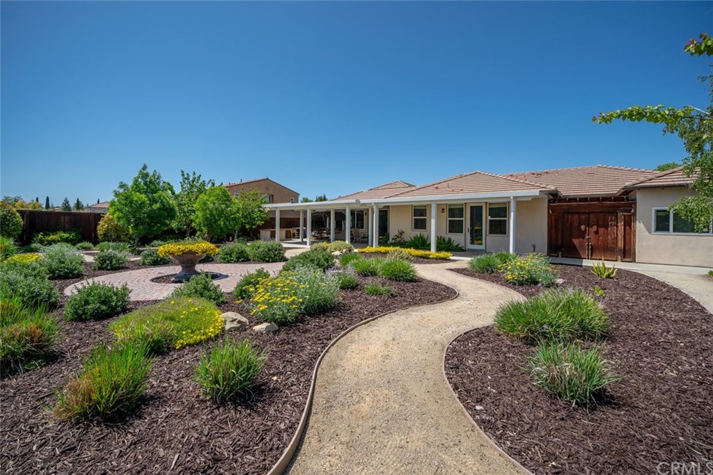1675 Via Rojas Templeton, CA 93465 - Photo 19 of 60 a front view of a house with a yard