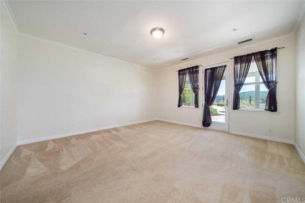 1675 Via Rojas Templeton, CA 93465 - Photo 27 of 60 an empty room with windows