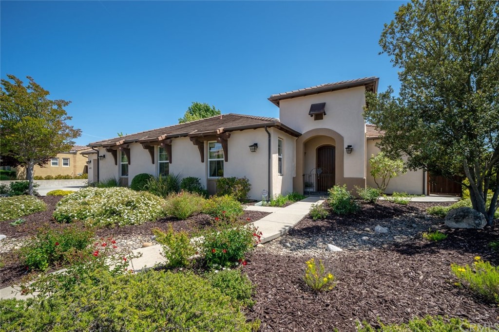 1675 Via Rojas Templeton, CA 93465 - Photo 3 of 60 a front view of a house with garden