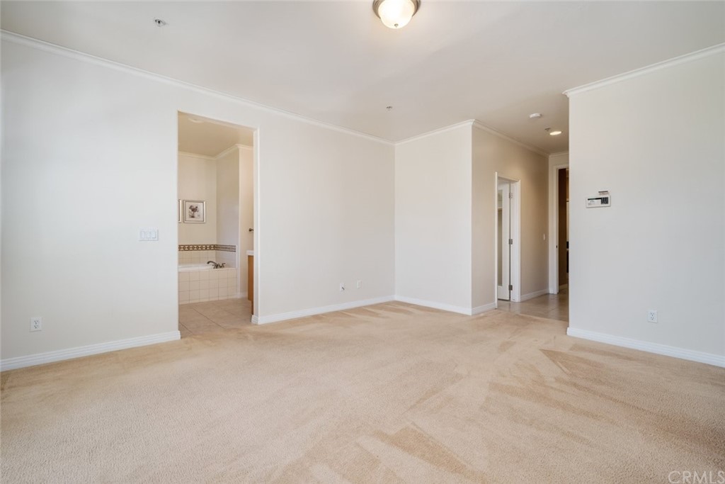 1675 Via Rojas Templeton, CA 93465 - Photo 33 of 60 an empty room with white cabinet and a bathroom