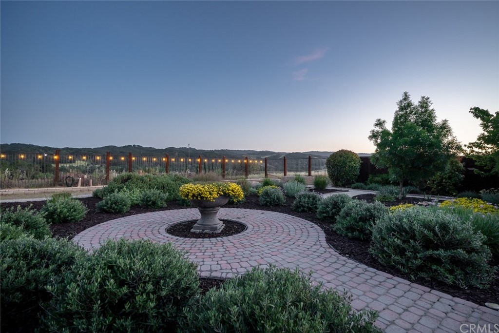 1675 Via Rojas Templeton, CA 93465 - Photo 54 of 60 a view of a water fountain in front of a house with a yard