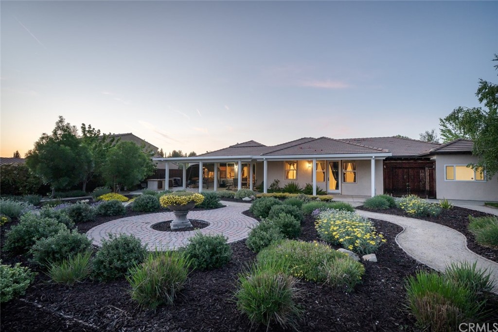 1675 Via Rojas Templeton, CA 93465 - Photo 55 of 60 a front view of a house with garden