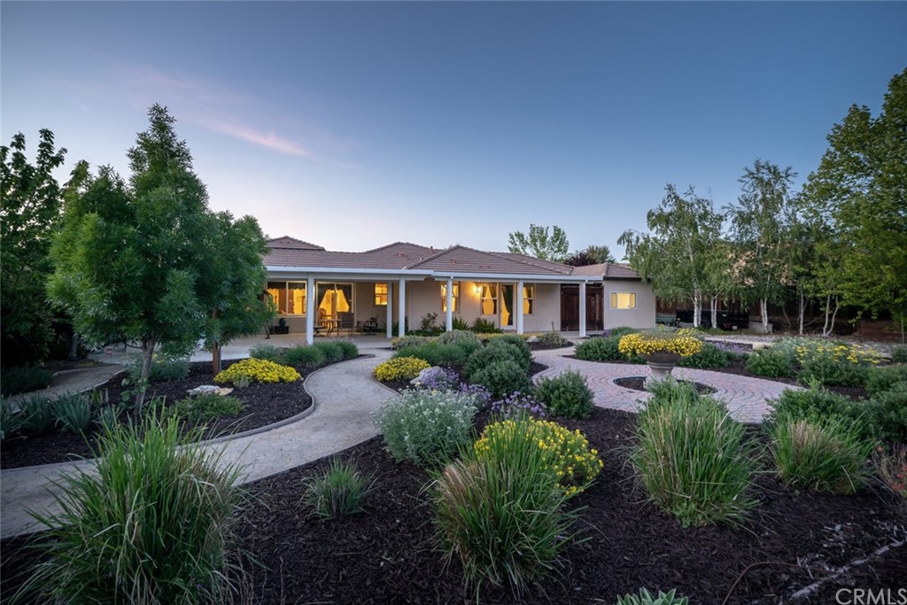 1675 Via Rojas Templeton, CA 93465 - Photo 56 of 60 a front view of a house with garden