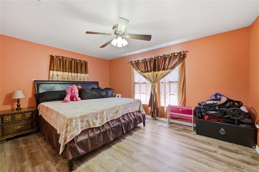 3624 Redbird Street Bellmead, TX 76705 - Photo 15 of 20 a bedroom with a bed and dresser