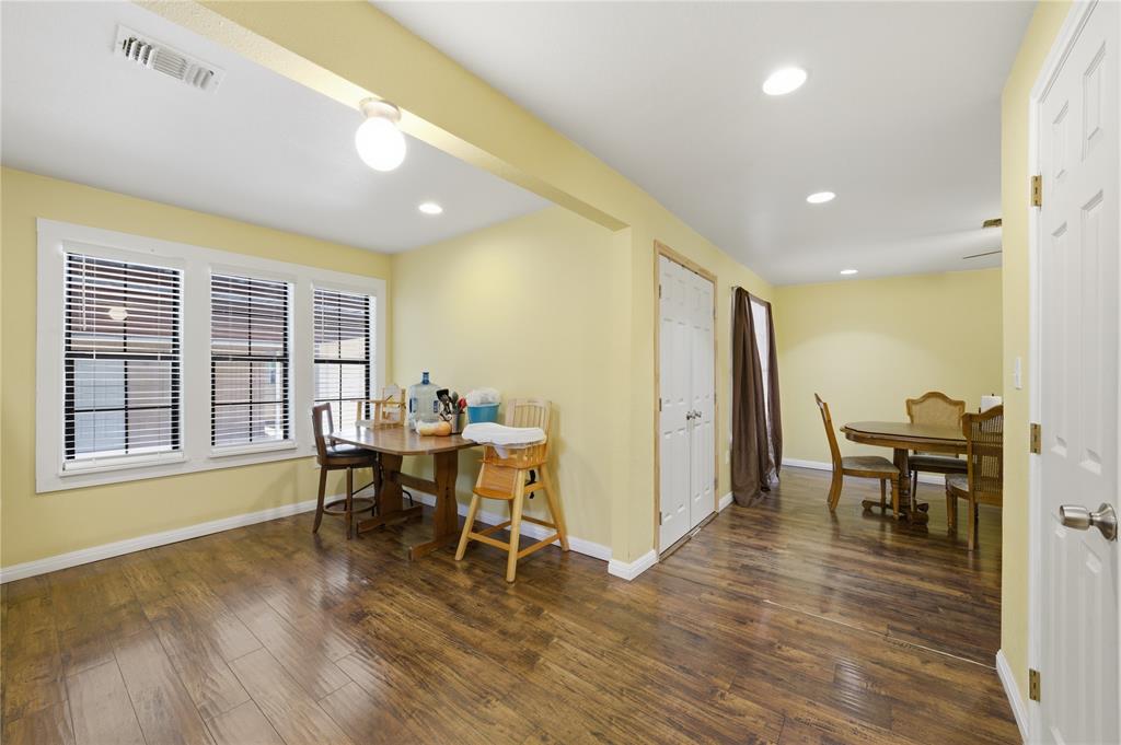 3624 Redbird Street Bellmead, TX 76705 - Photo 7 of 20 a view of a dining room with furniture and wooden floor