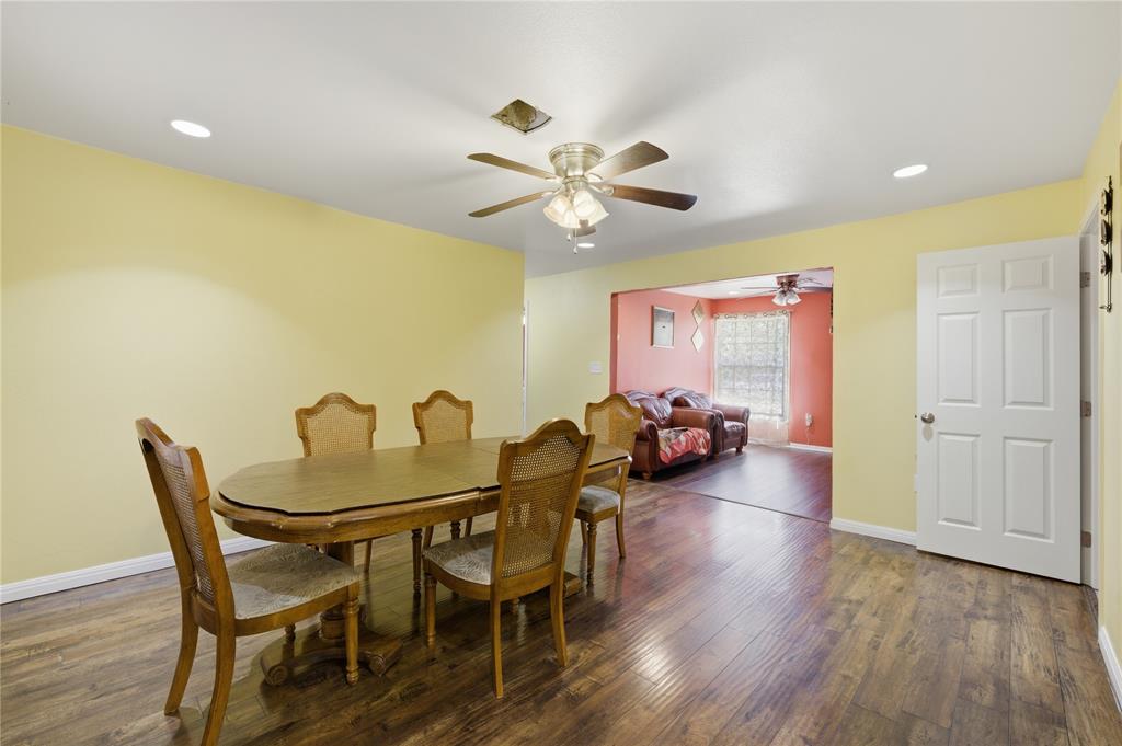 3624 Redbird Street Bellmead, TX 76705 - Photo 8 of 20 a view of a dining room with furniture and wooden floor