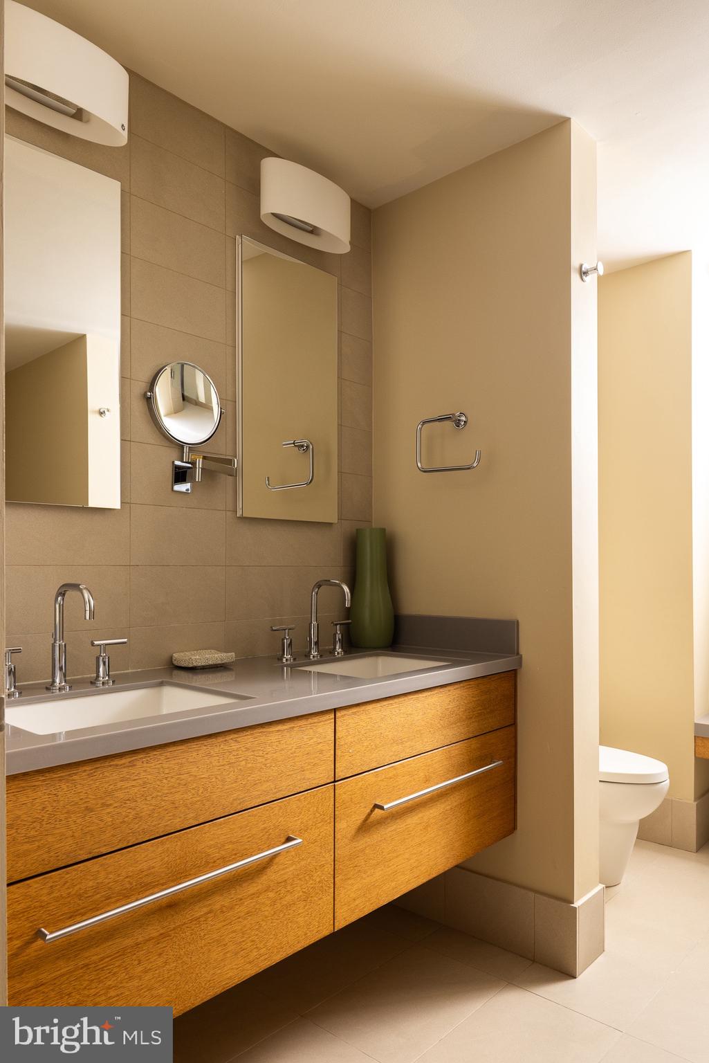 372 Brownsburg Road Newtown, PA 18940 - Photo 33 of 81 a bathroom with a sink a toilet and a mirror