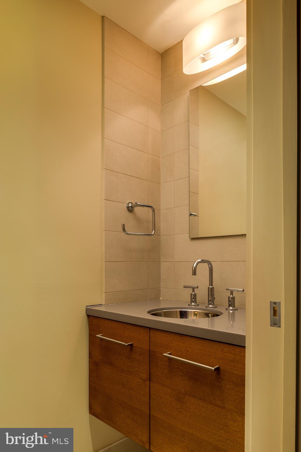 372 Brownsburg Road Newtown, PA 18940 - Photo 36 of 81 a bathroom with a sink and mirror