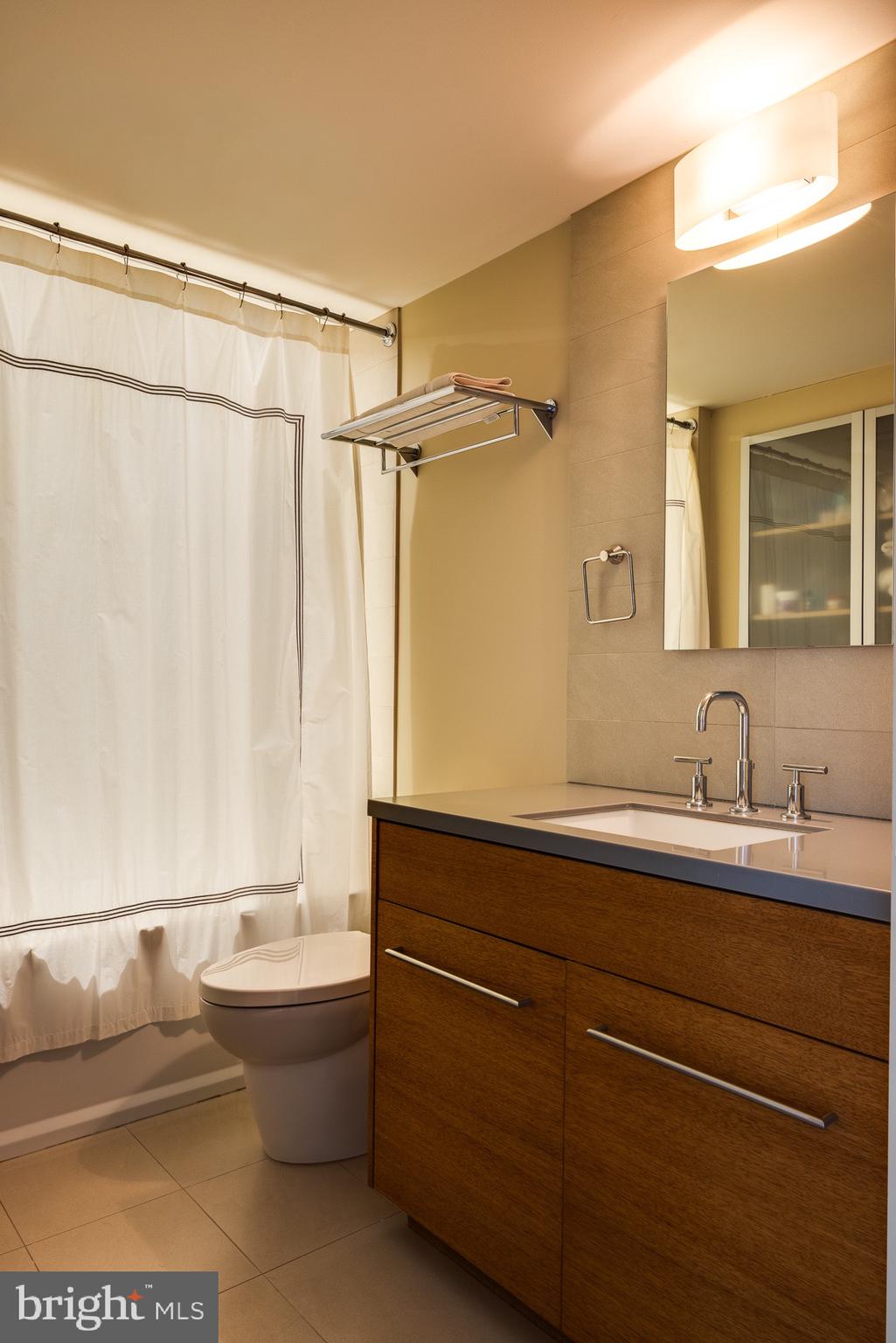 372 Brownsburg Road Newtown, PA 18940 - Photo 53 of 81 a bathroom with a tub sink and mirror