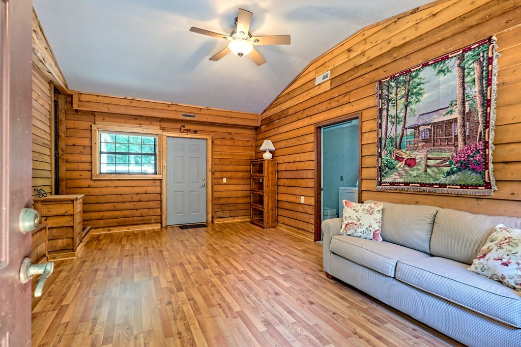 641 Cold Branch Road Hayesville, NC 28904 - Photo 21 of 65 a living room with furniture and wooden floor