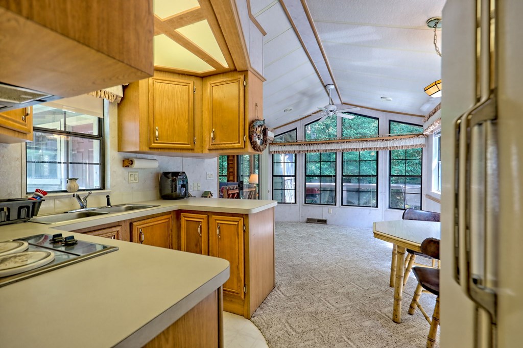 641 Cold Branch Road Hayesville, NC 28904 - Photo 29 of 65 a kitchen that has a sink and a stove