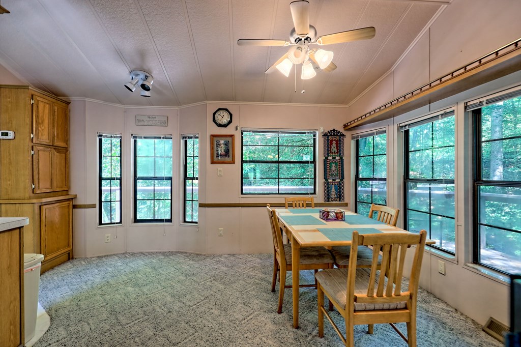 641 Cold Branch Road Hayesville, NC 28904 - Photo 37 of 65 a dining room with furniture window and outside view