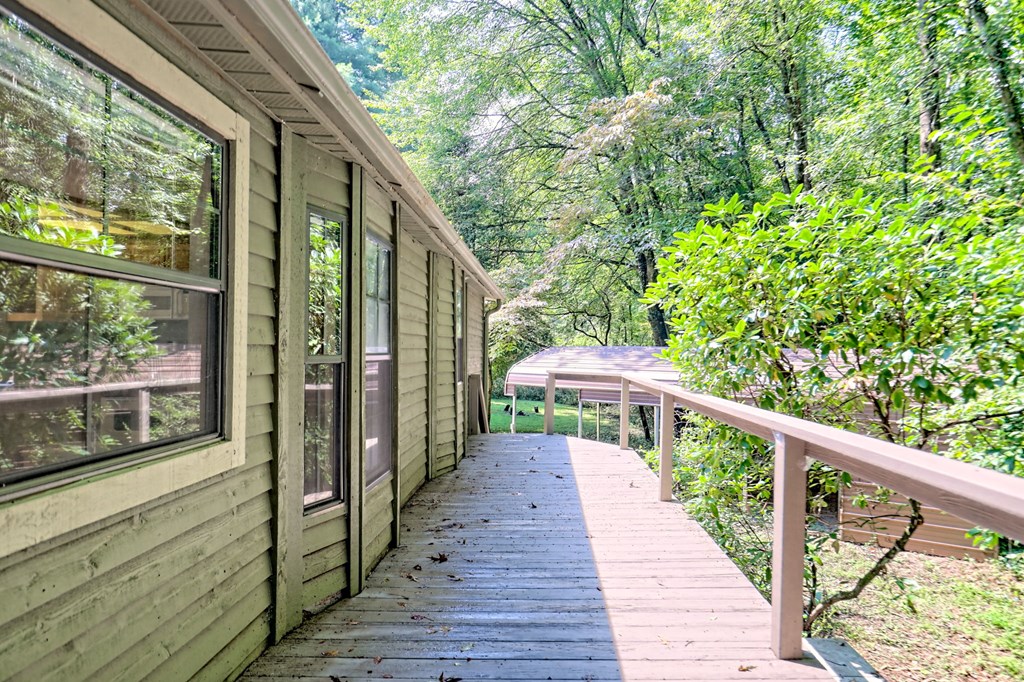 641 Cold Branch Road Hayesville, NC 28904 - Photo 52 of 65 a balcony with wooden floor and outdoor space