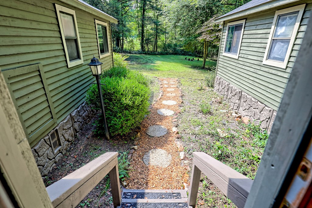 641 Cold Branch Road Hayesville, NC 28904 - Photo 8 of 65 a view of a backyard with pathway