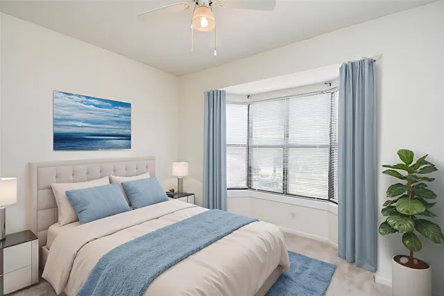 an empty room with a empty space and windows