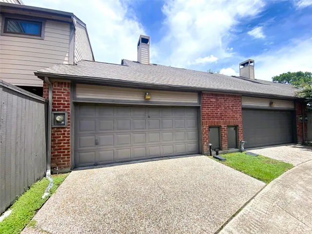 a swimming pool with outdoor seating and yard