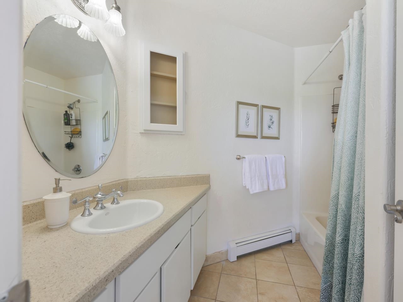 2433 H Road Grand Junction, CO 81505 - Photo 26 of 42 a bathroom with a sink a toilet and mirror