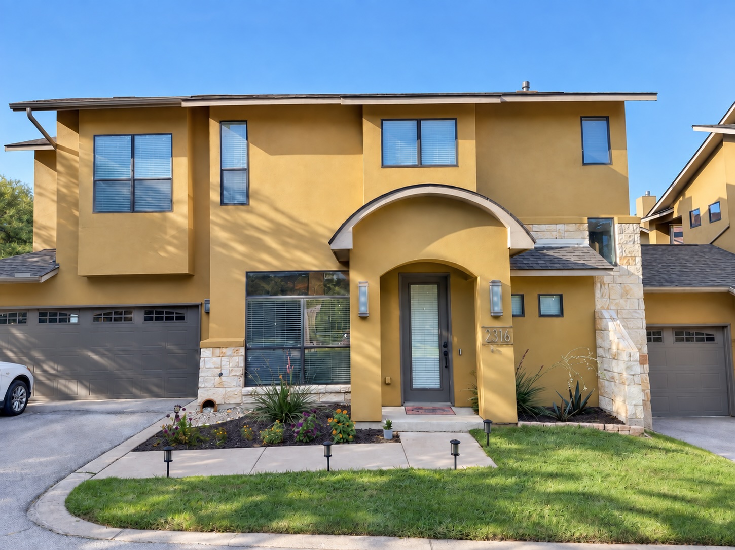 2316 Thornton Road, Unit B Austin, TX 78704 - Photo 1 of 25 An arched entry and stone accents define the facade of this multi-level home.