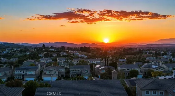 a view of a city with sunset view